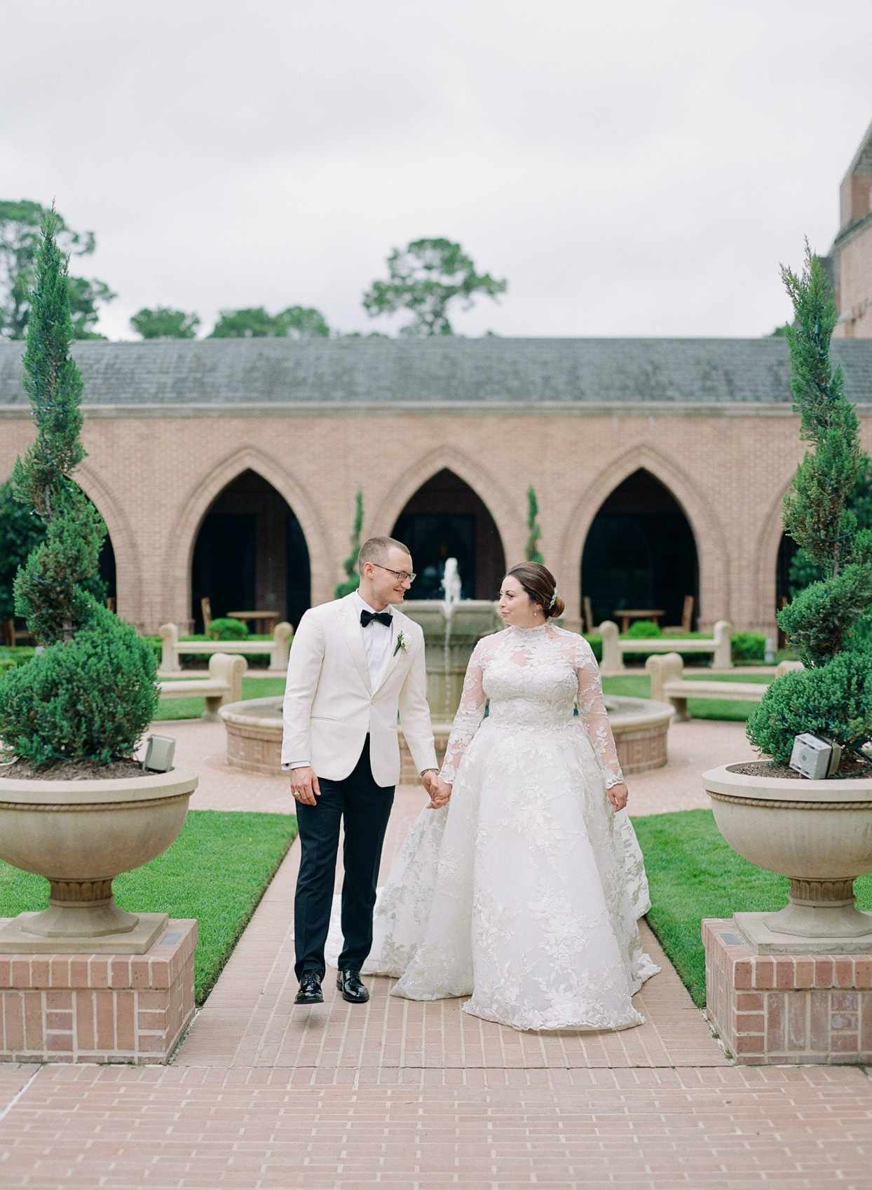 bride and groom portrait in elegant courtyard