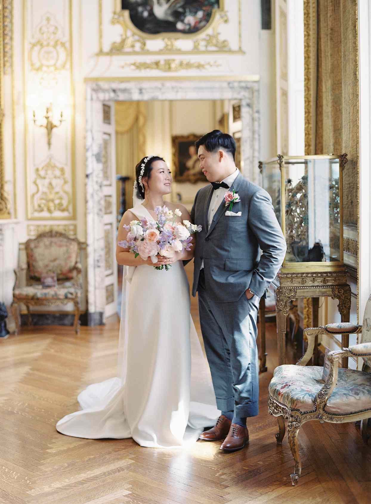bride and groom share first look inside