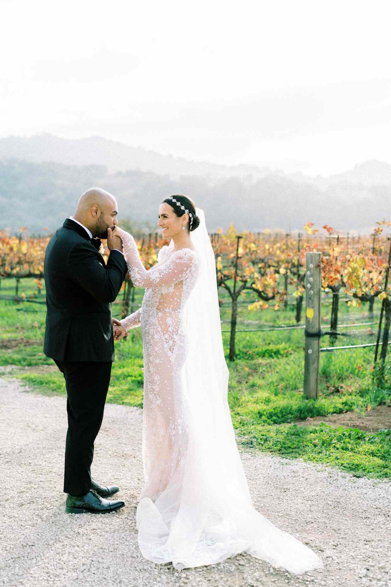 wedding couple portrait in front of vineyard