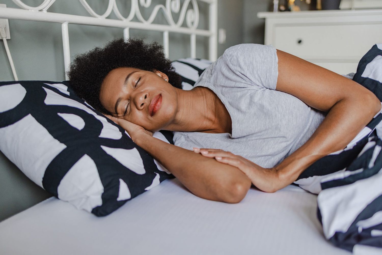 woman sleeping in bed comfortably