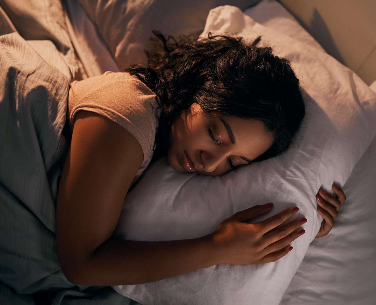 woman sleeping head on pillow