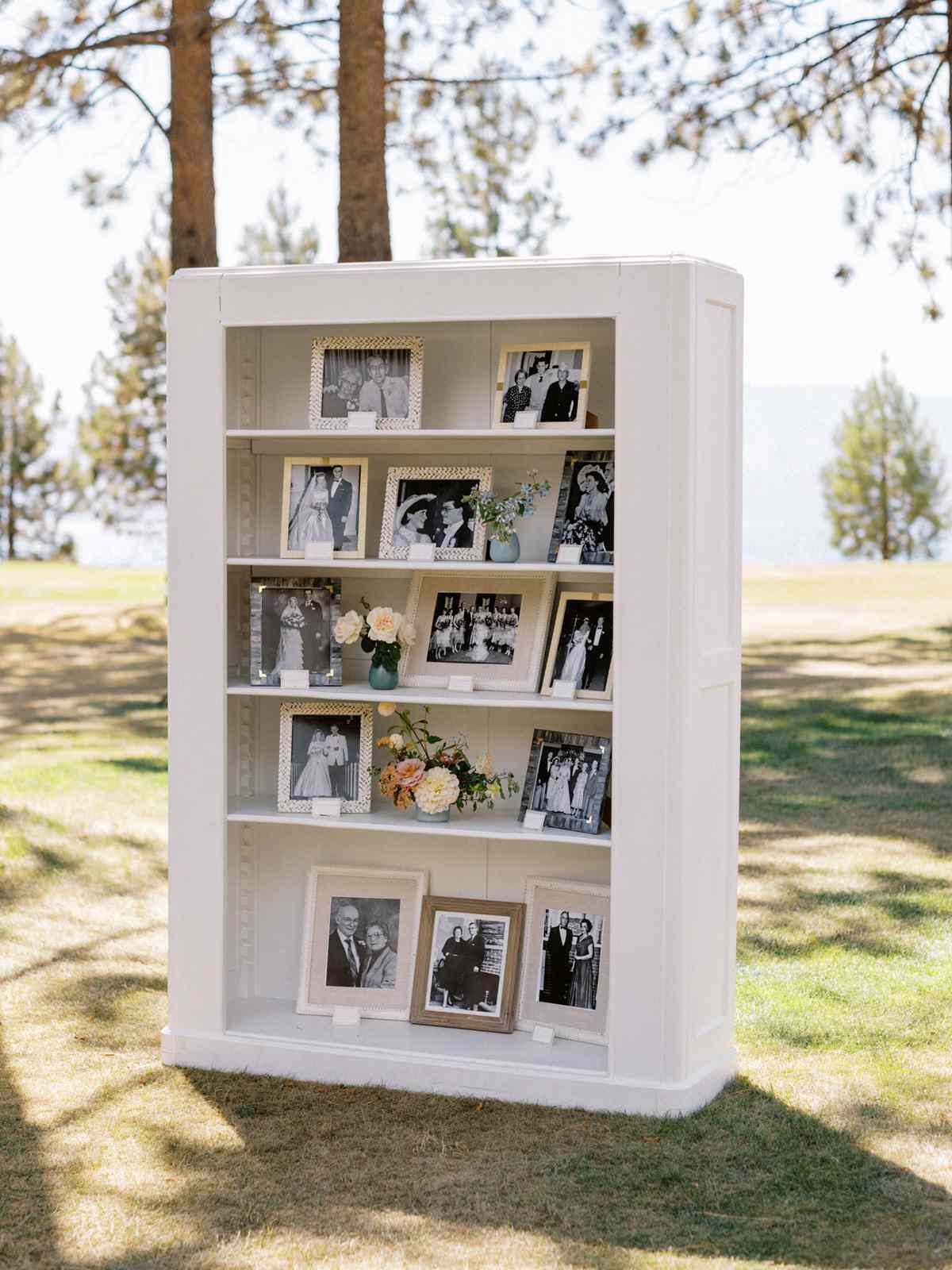 vintage family couple photos display in white bookcase