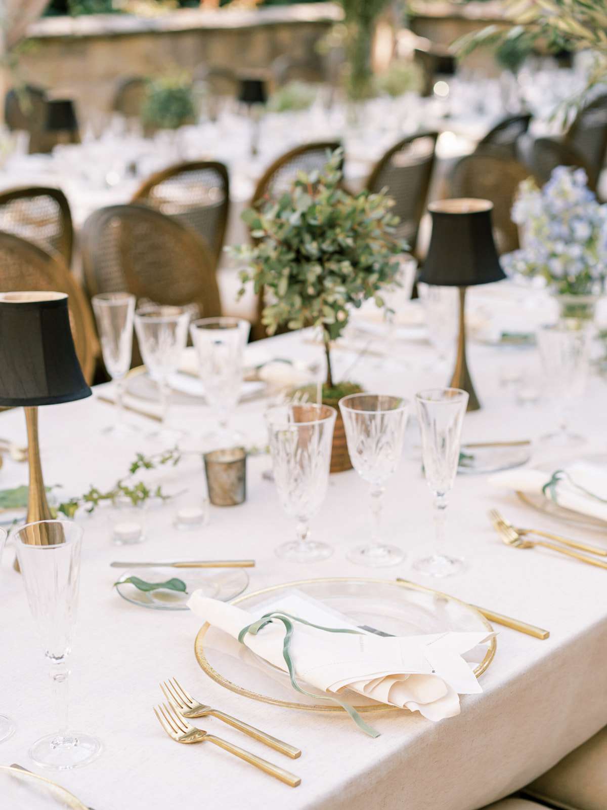 gold, green, and white wedding reception table