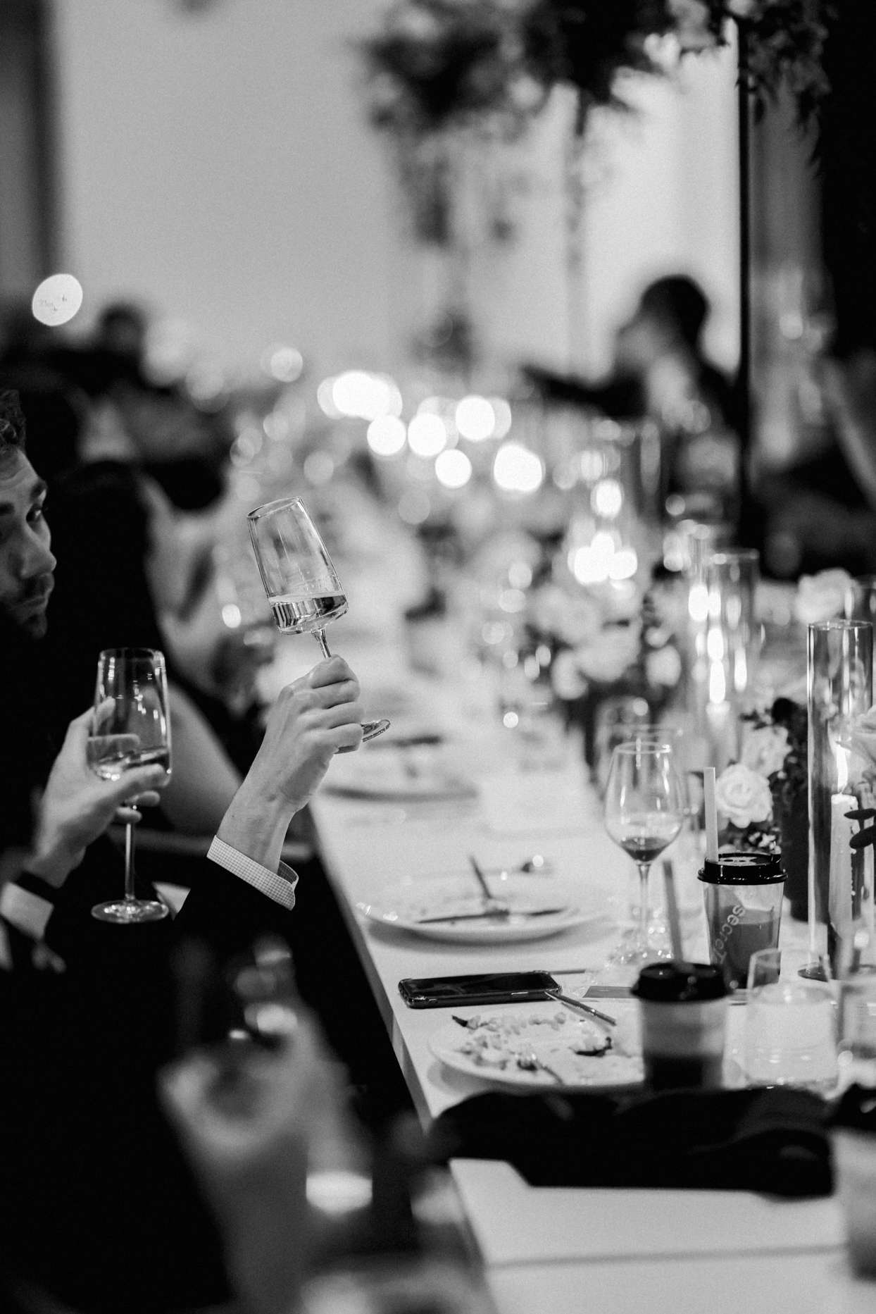 guests toasting champagne glasses
