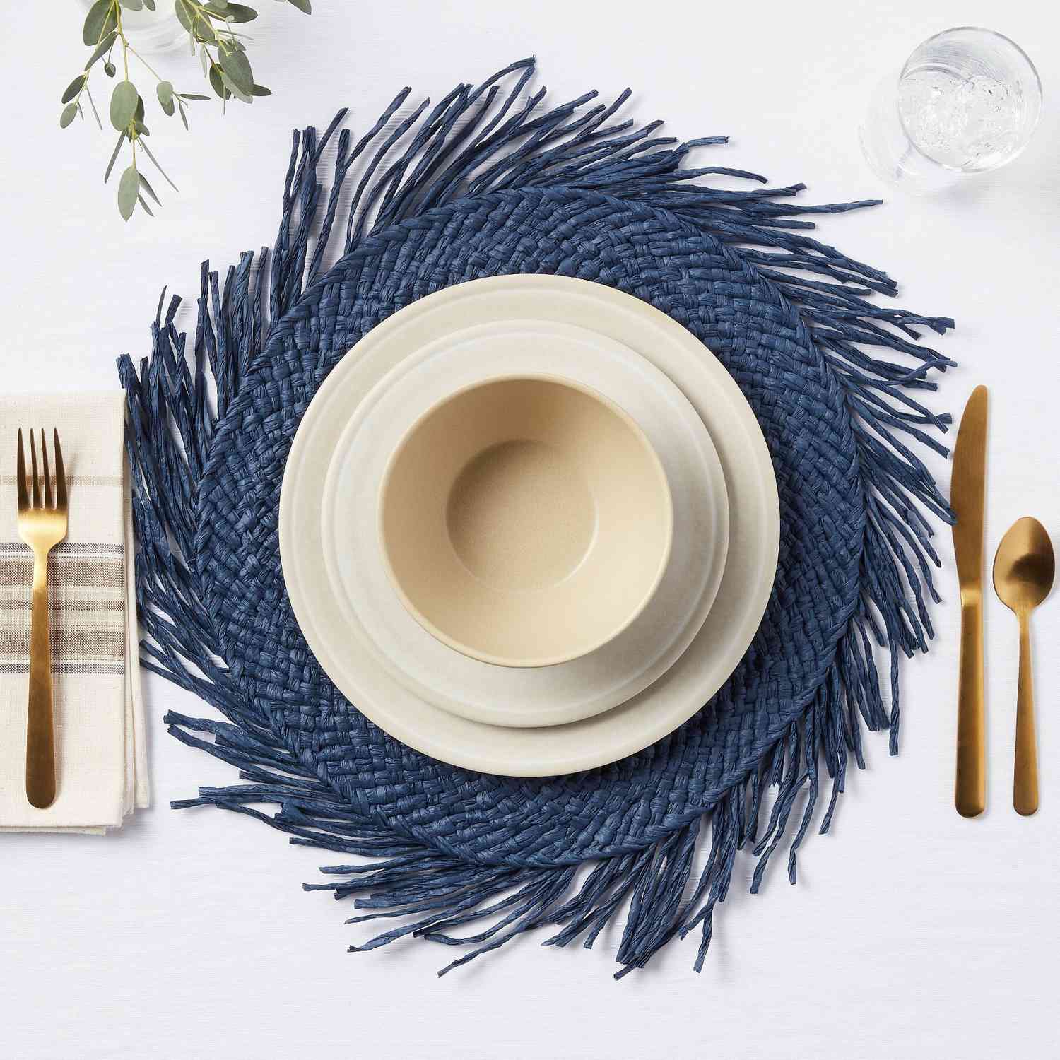 blue paper charger with fringe