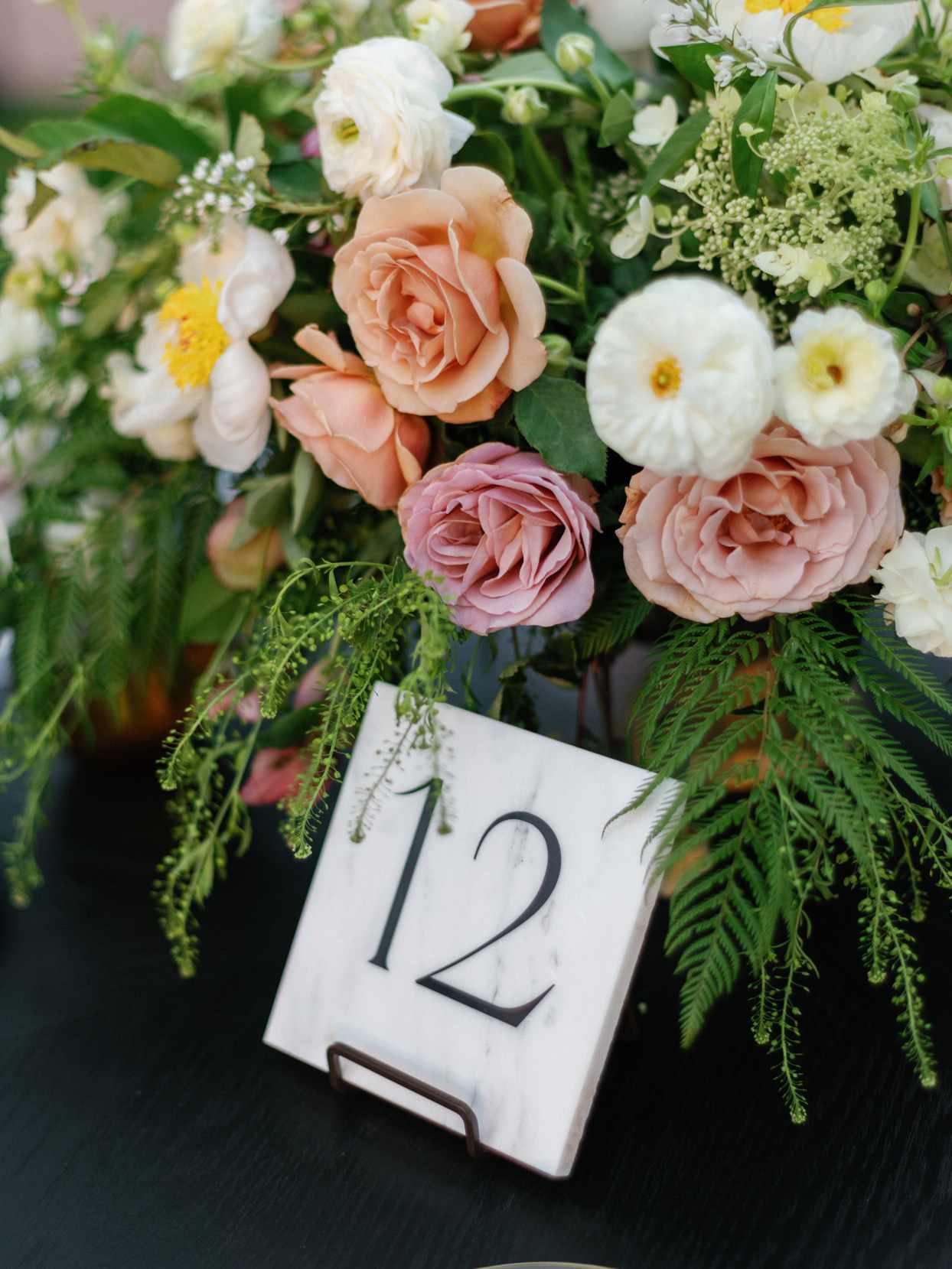 floral table centerpiece with marble table number