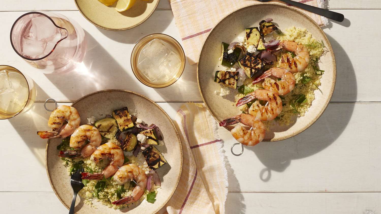 shrimp skewers with chopped zucchini salad