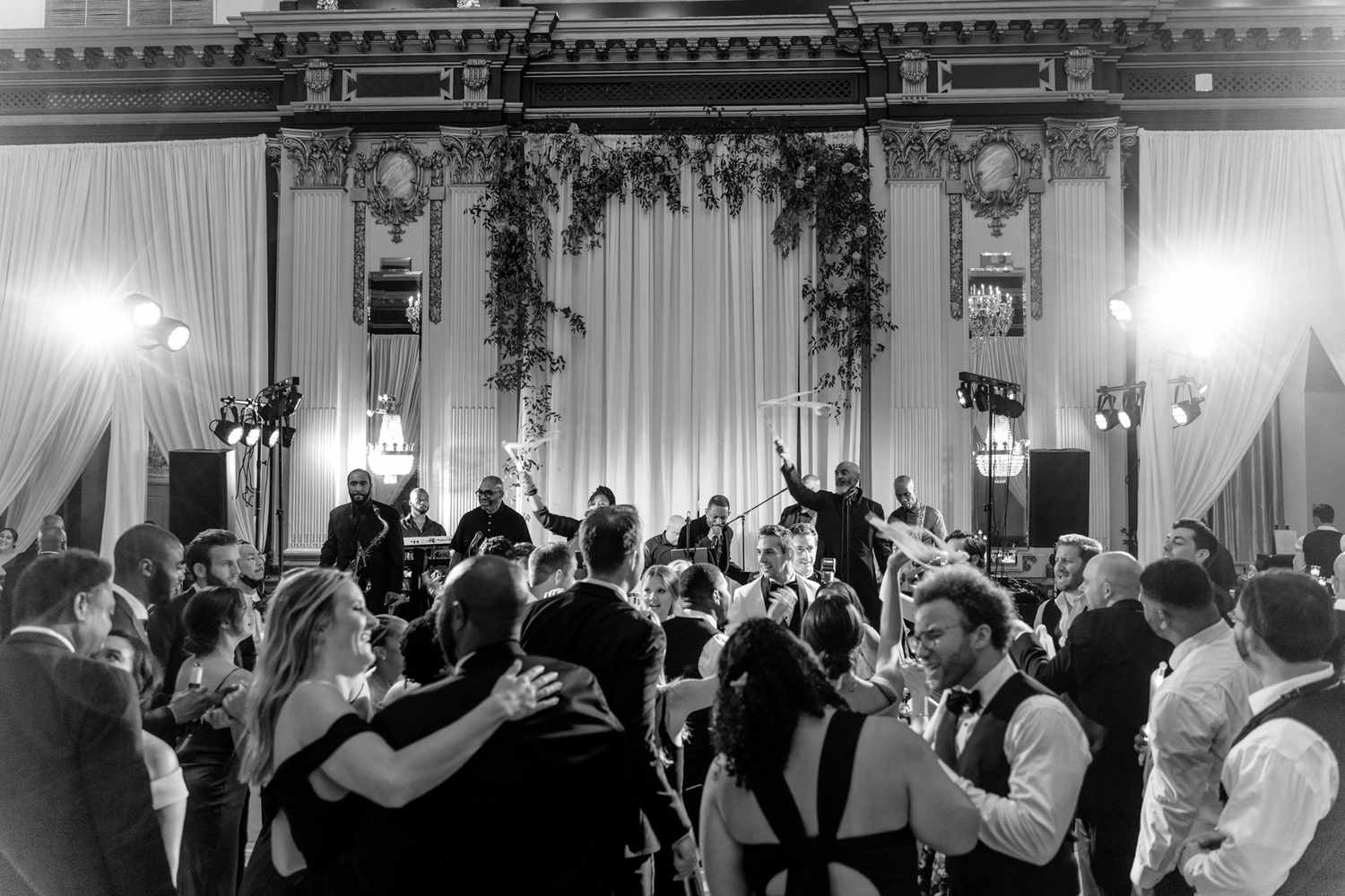 guests dancing at indoor wedding reception