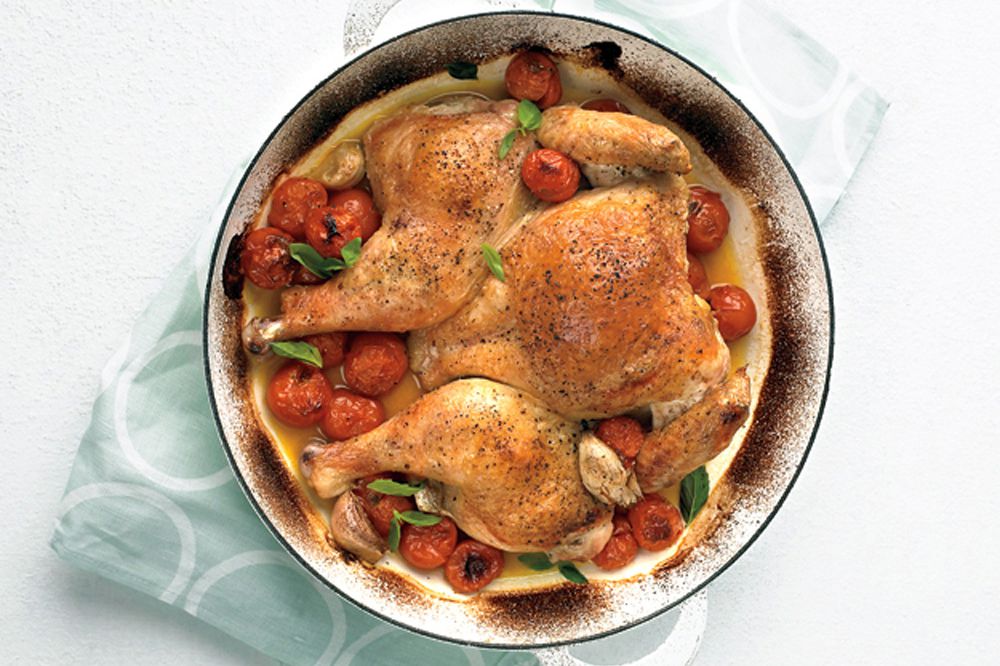 spatchcocked chicken with tomatoes