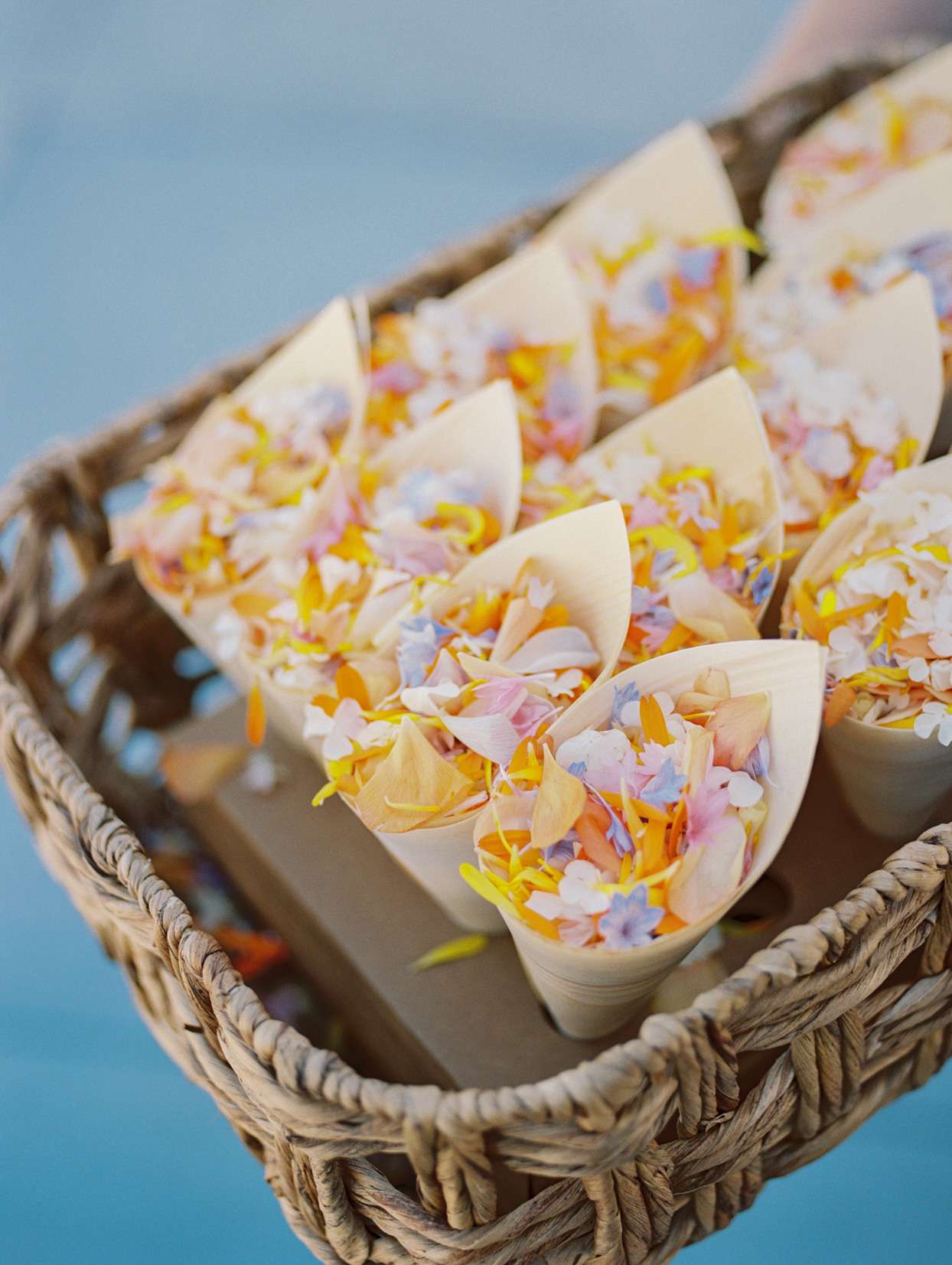 paper cups of wedding ceremony flower petals