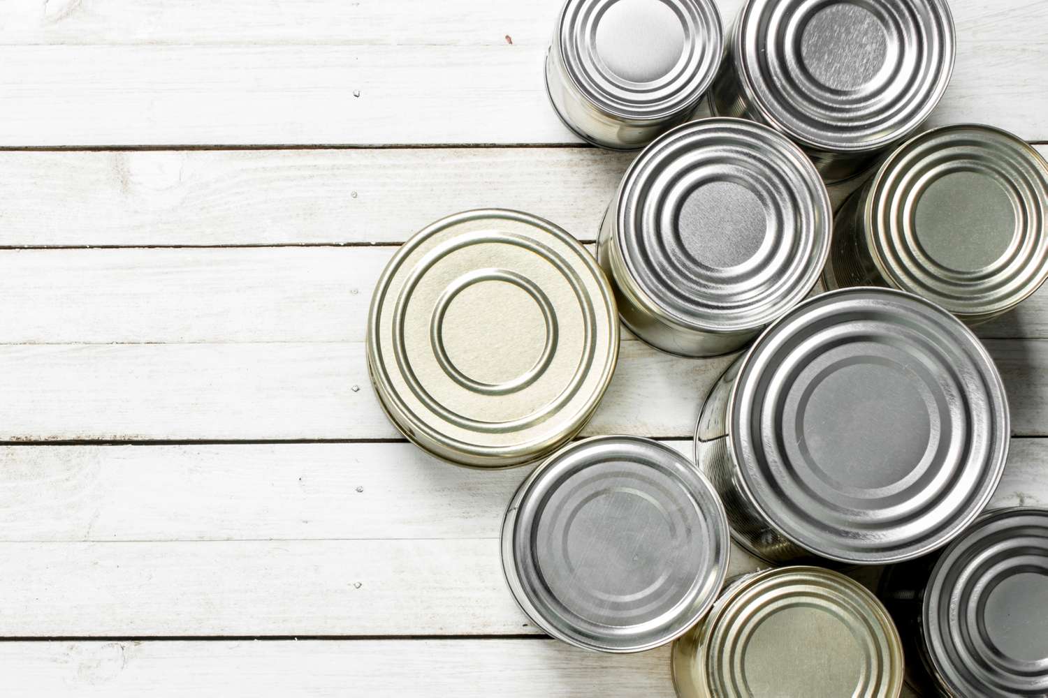 canned food on wood surface