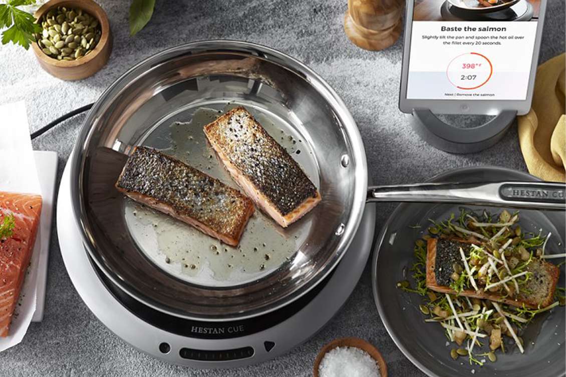 single induction burner being used to prepare salmon filets