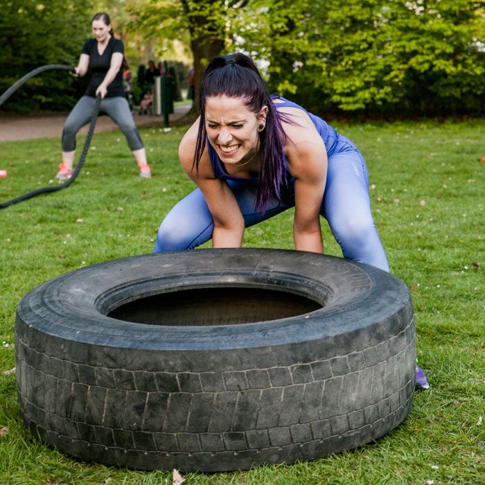 woman-throwing-tire