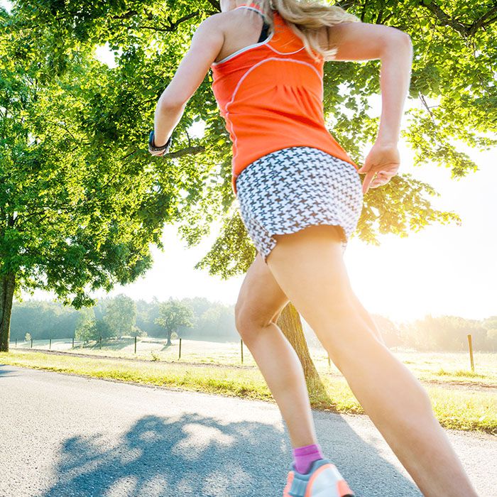young-woman-running-sun.jpg