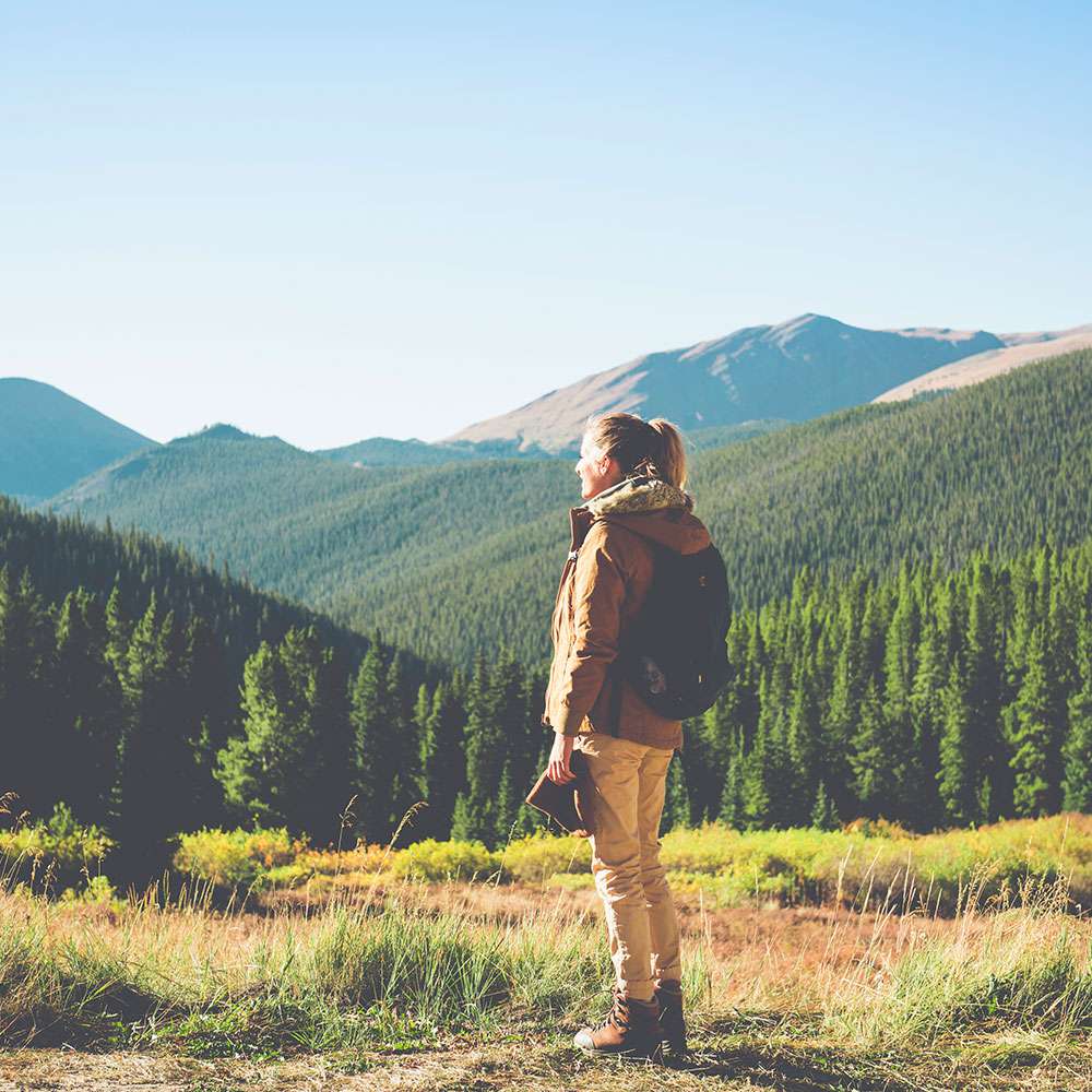 millennial woman hiking national park