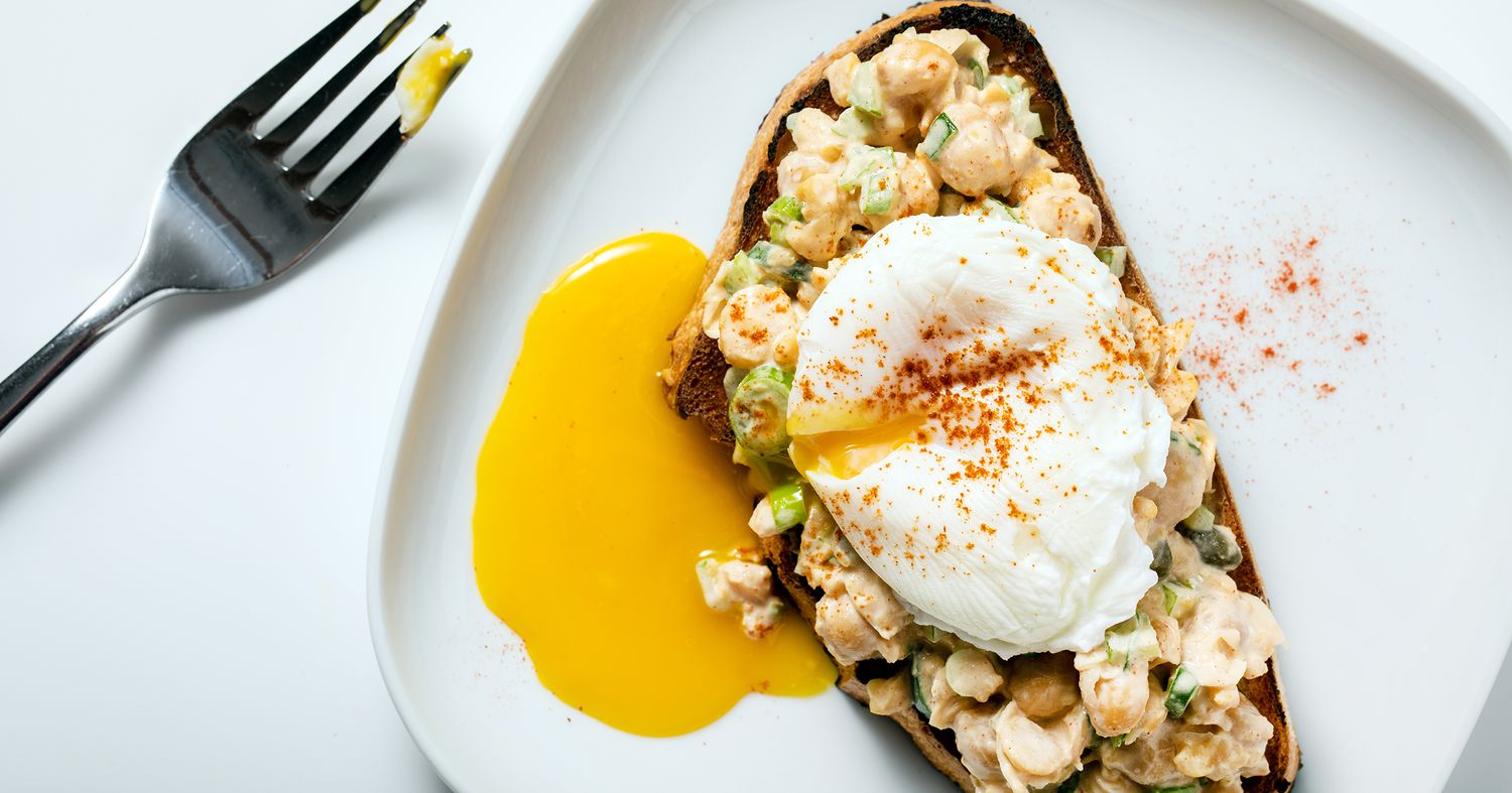 WASHINGTON, DC - APRIL 26 : Chickpea Salad Toasts With Poached Egg photographed for the Voraciously newsletter at The Washington Post via Getty Images in Washington DC on April 26, 2019. (Justin Tsucalas for the Washington Post; food styling by Nichole Bryant for the Washington Post)