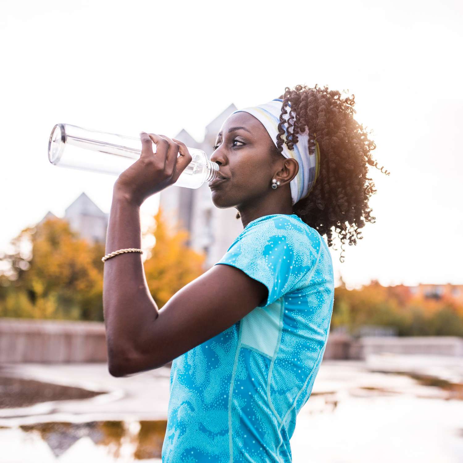 Woman_Drinking_Water_After_Exercising