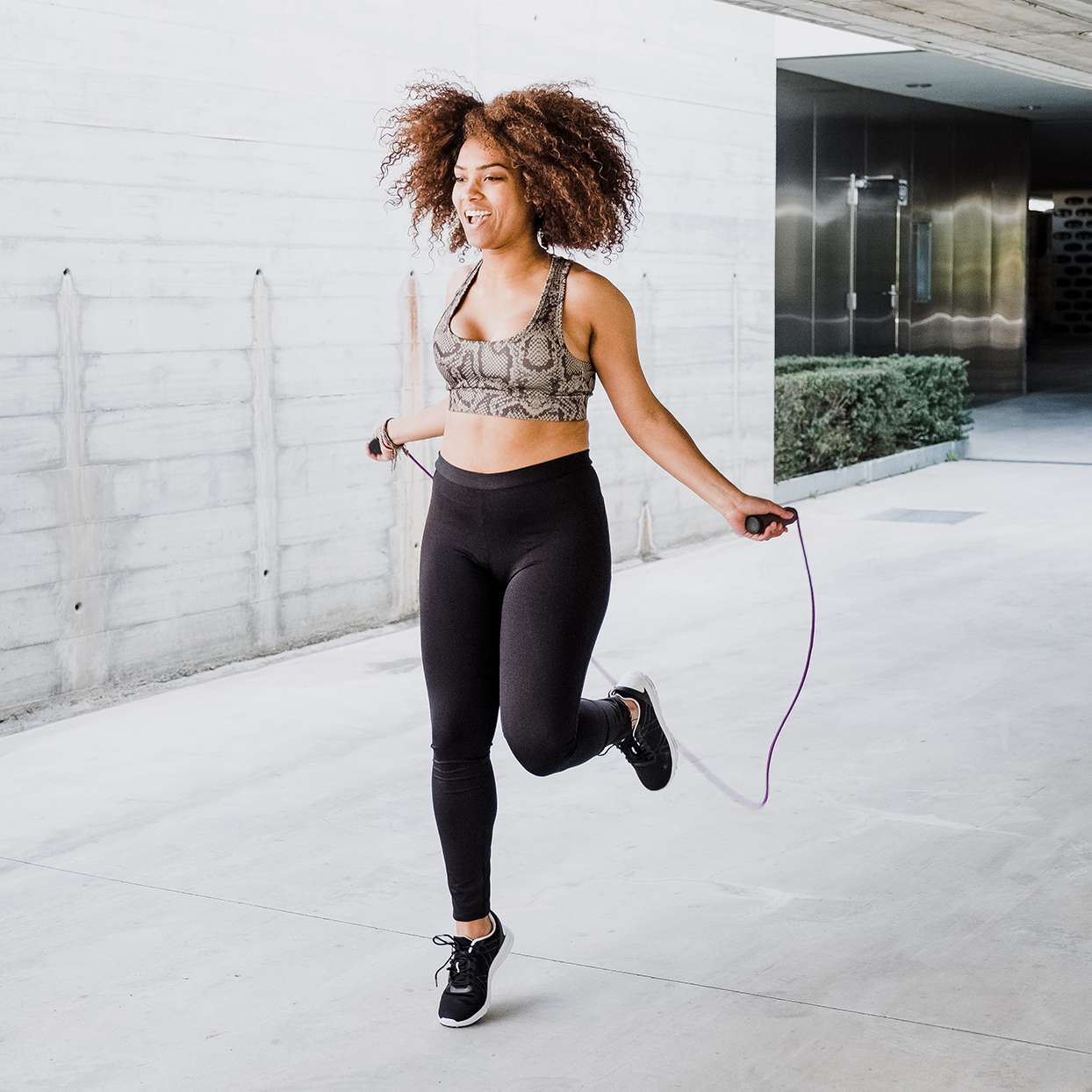 Woman doing a jump rope HIIT workout