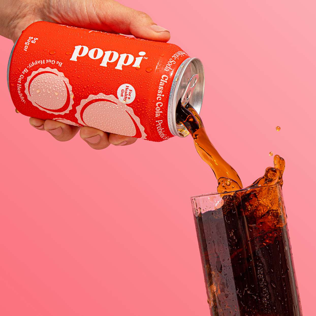 Poppi Classic Cola pouring into a glass