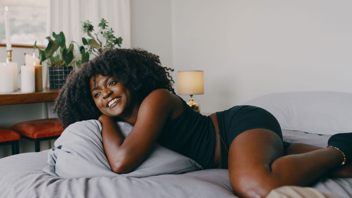 Smiling_Woman_In_Bed_In_the_Morning