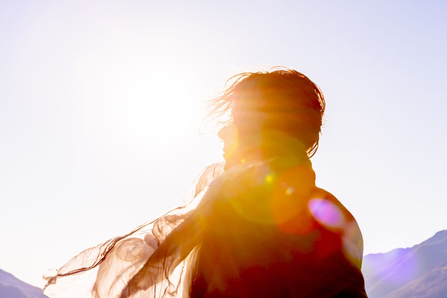 What My Abortion Gave Me , Woman with Moving Hair and Scarf in Sunlight in a Windy Day