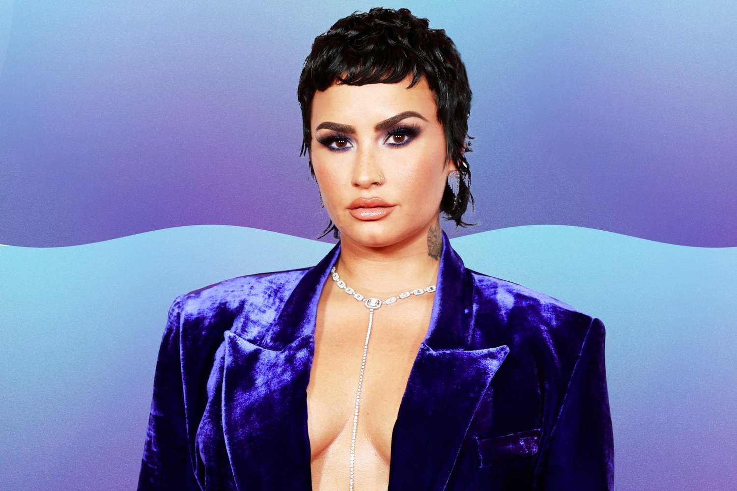 Demi-Lovato-Debuted-a-New-Spider-Tattoo-on-Their-Freshly-Shaved-Head-We-Are-All-Connected-GettyImages-1320403769