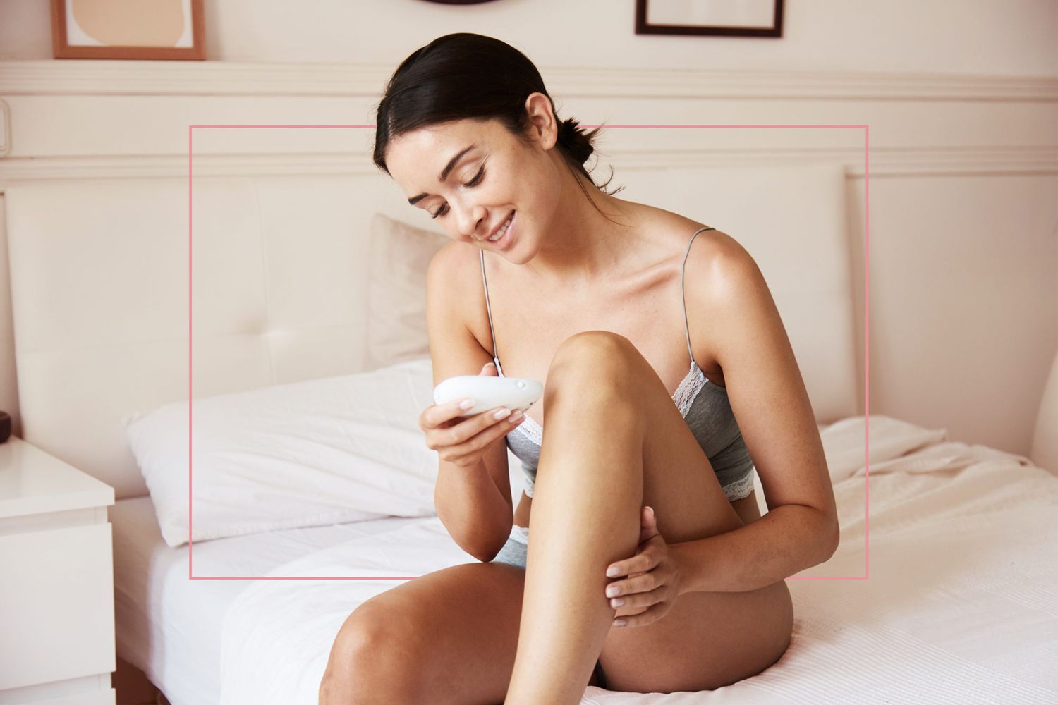 Woman using at home hair removal device at home