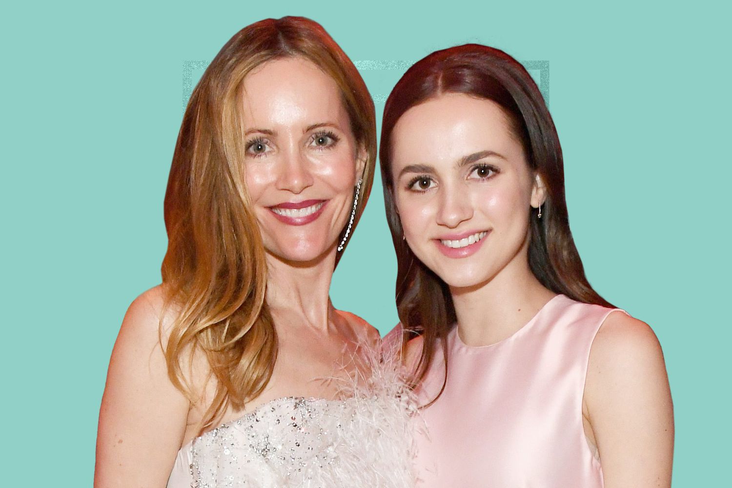 Leslie Mann with her daughter Maude Apatow at a Vanity Fair Event against a teal background