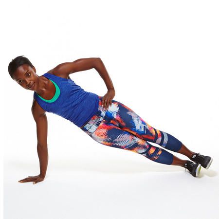 woman performing Side Plank Leg Lifts