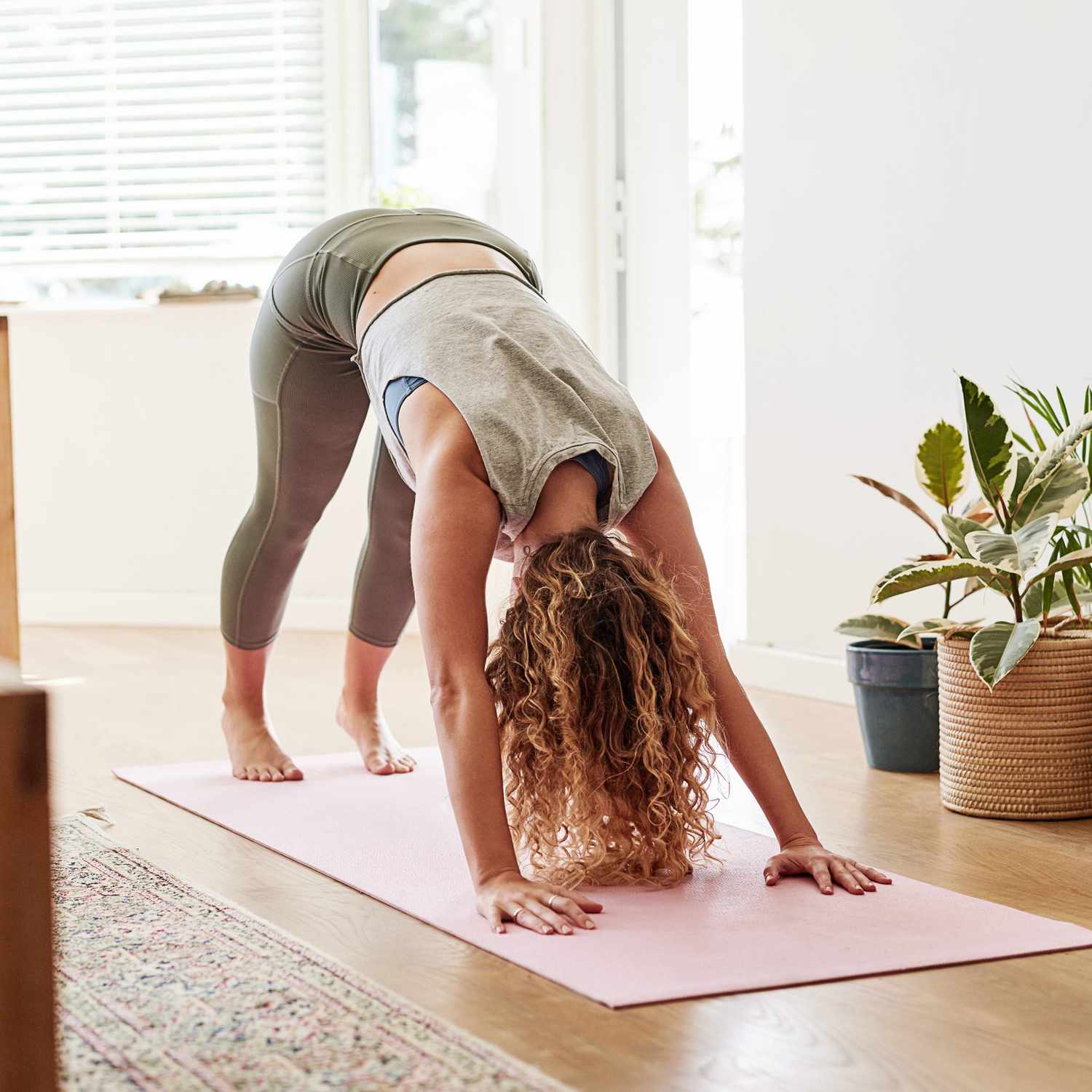 Woman in Downward Dog Stretch Position
