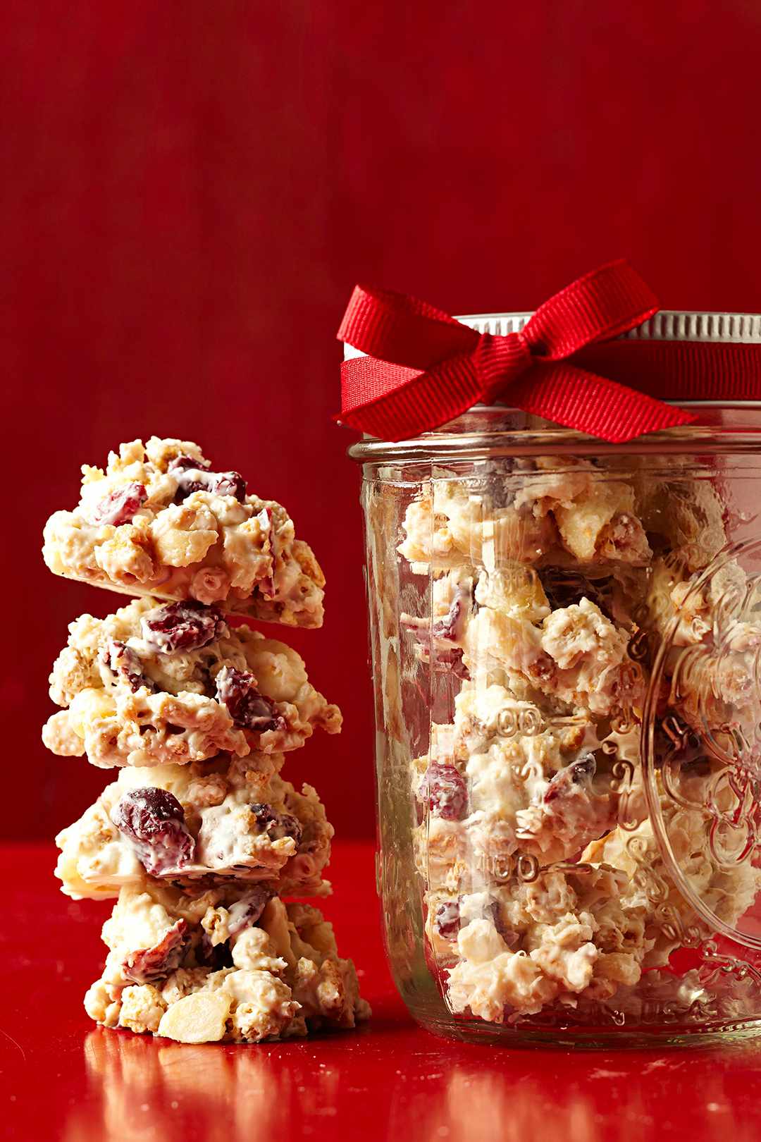 Cranberry-Vanilla Cereal Drops in jar and stacked