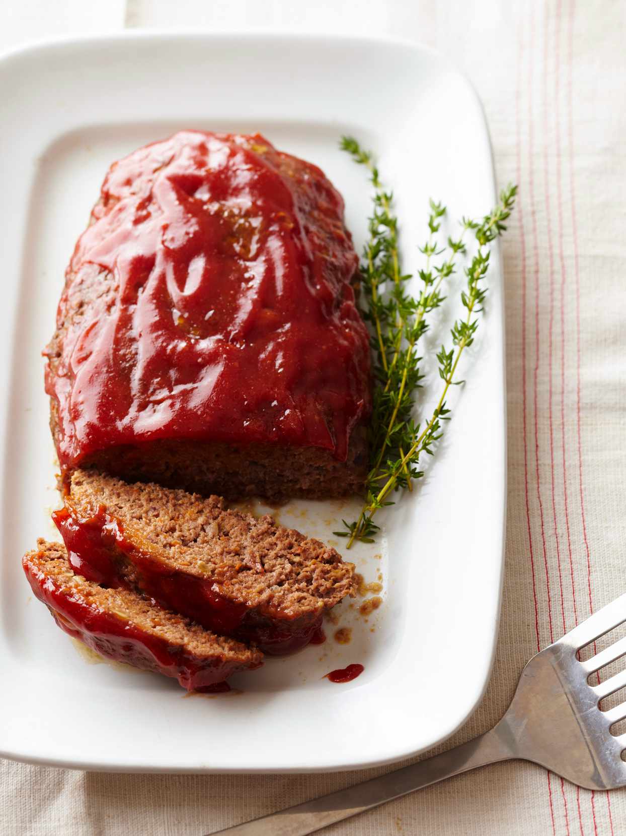 The Best Meatloaf on white plate