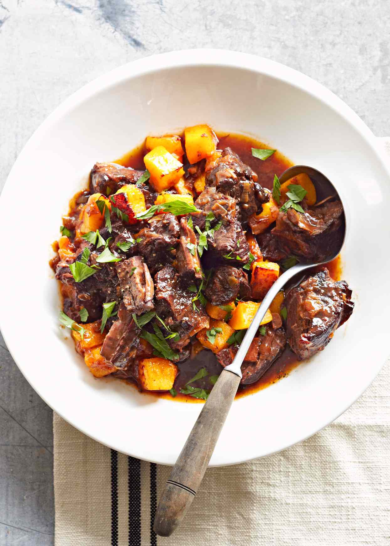 Rich Beef Stew with Bacon and Plums
