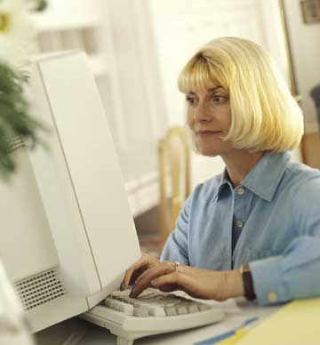 Blond woman at computer