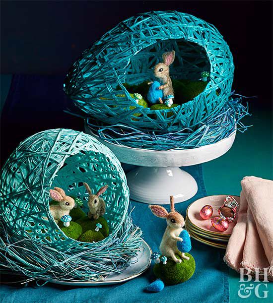 blue dyed raffia nests on cake stand