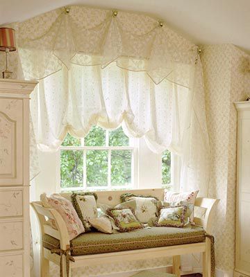 ivory baby room with sheer window treatments