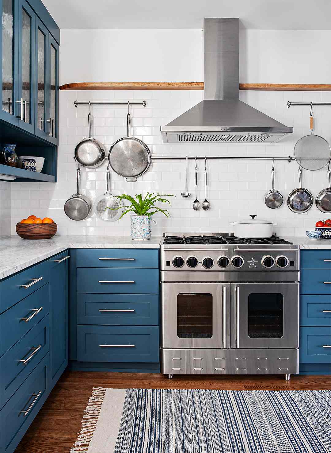statement blue kitchen tour oven pans pots drawers
