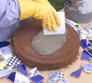 Mosaic Stepping Stone: applying mortar