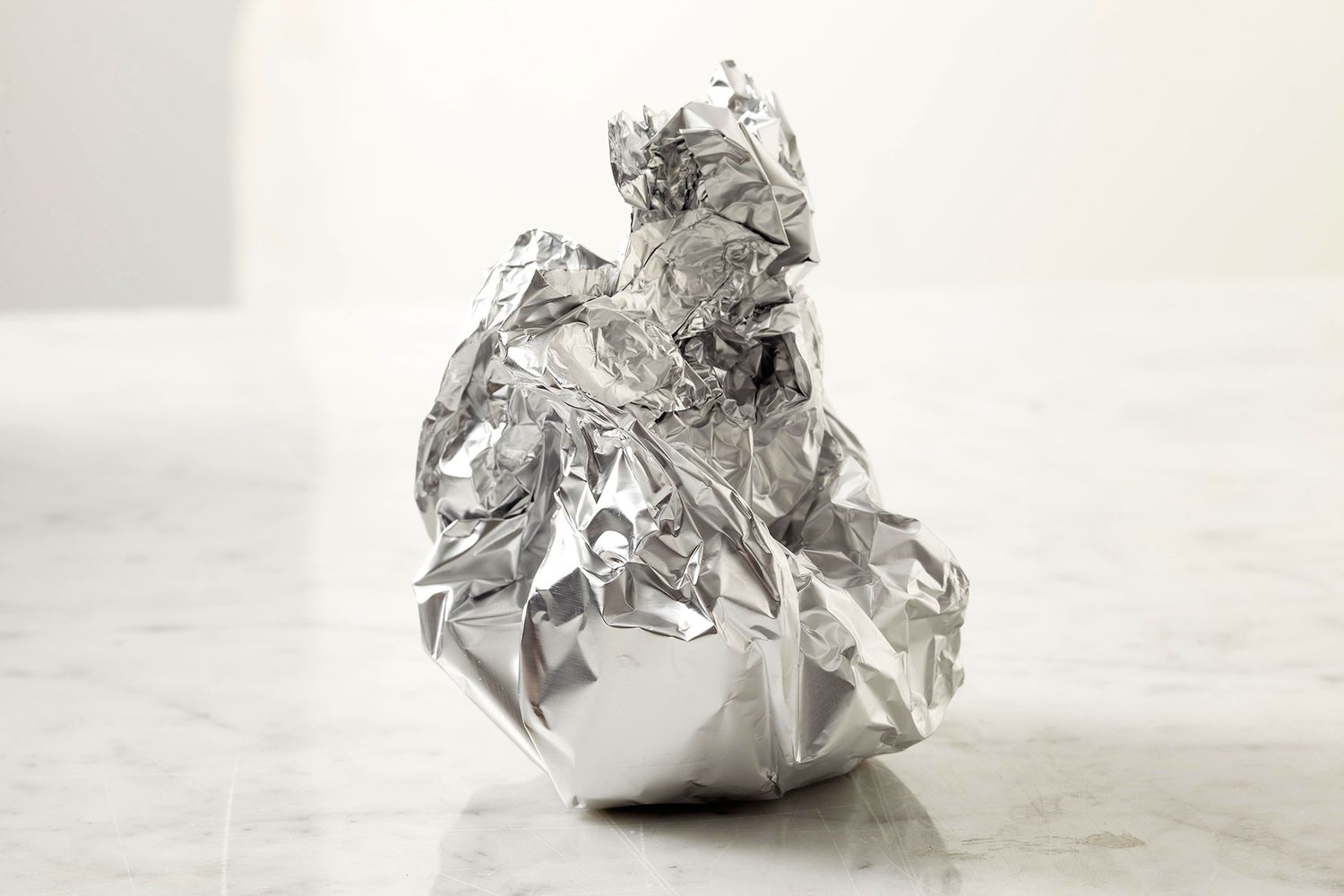 garlic bulb wrapped aluminum foil