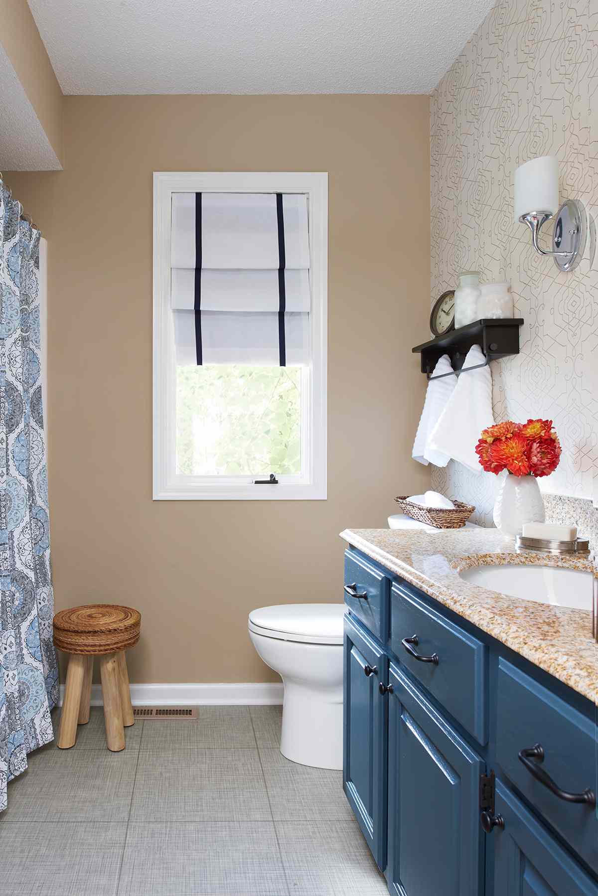 small bathroom navy blue vanity resilient flooring