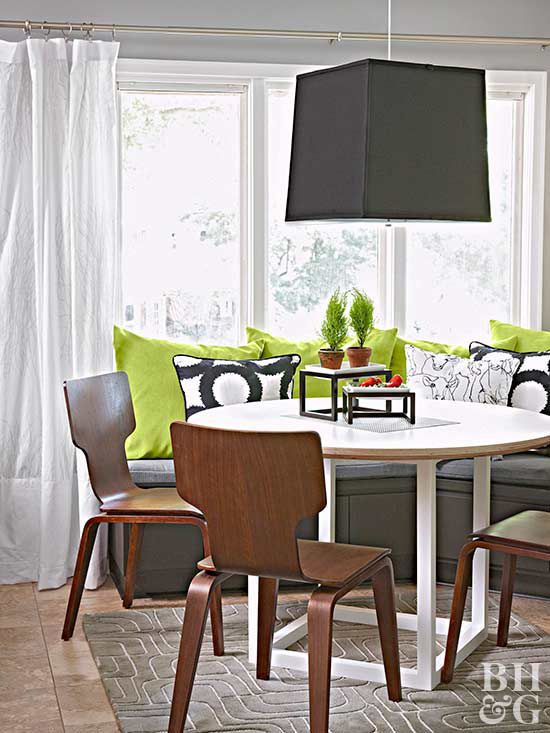 high-contrast breakfast nook with green accent