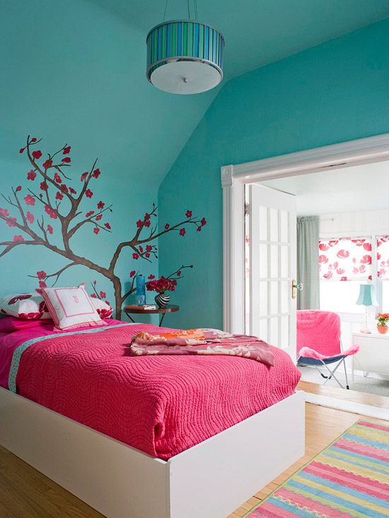 pink and teal girl's room with tree