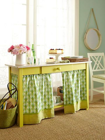 Yellow console table with curtain