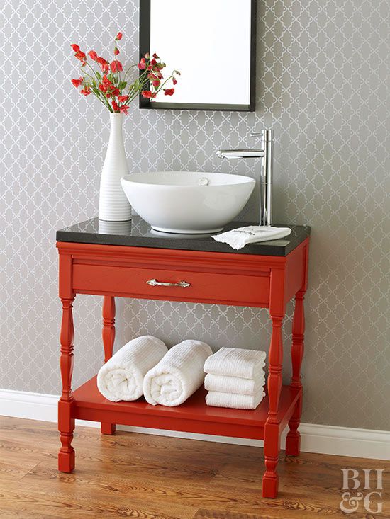 Red vanity with vessel sink