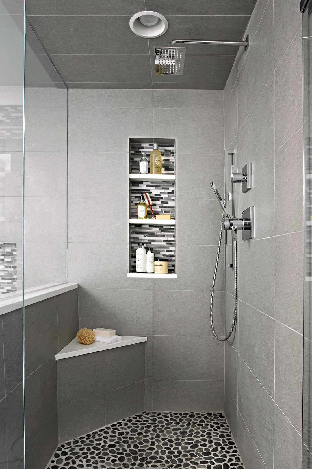 gray shower with bench and niche