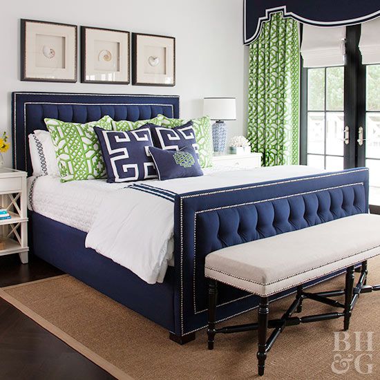 Blue bed white bedding green accent pillows