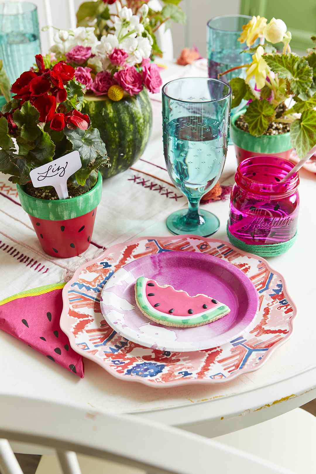 table setting for watermelon-themed party
