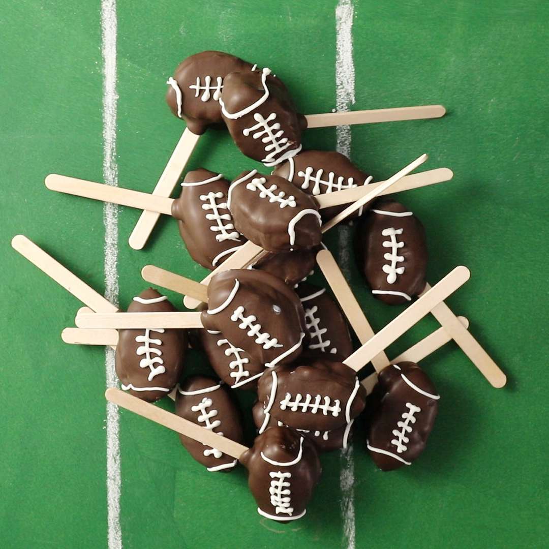 bunch of football cookie dough pops