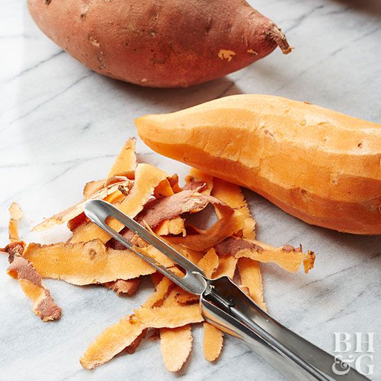 peeled sweet potatoes next to pile of skil peels
