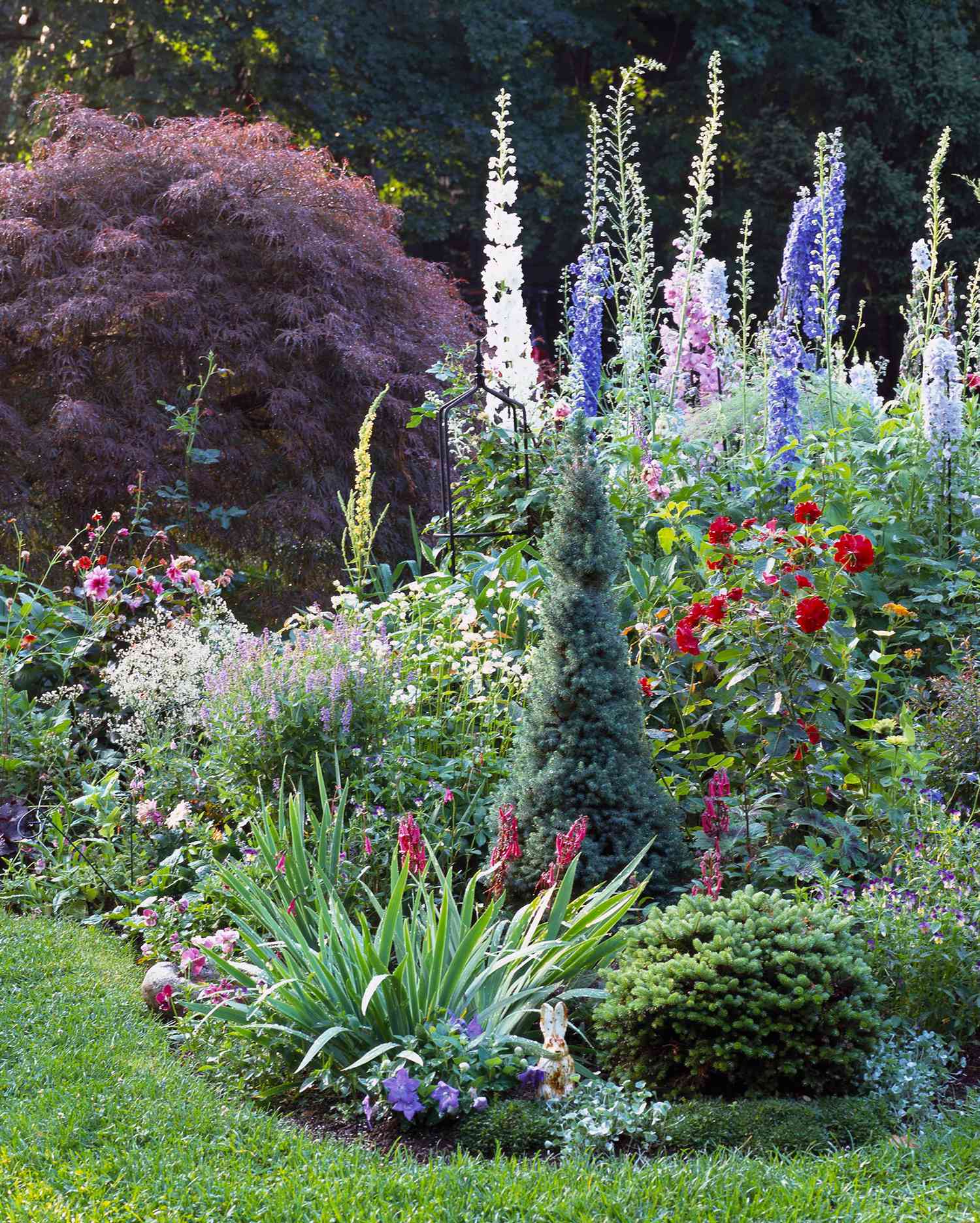 cottage garden with various heights of flowers and greenery